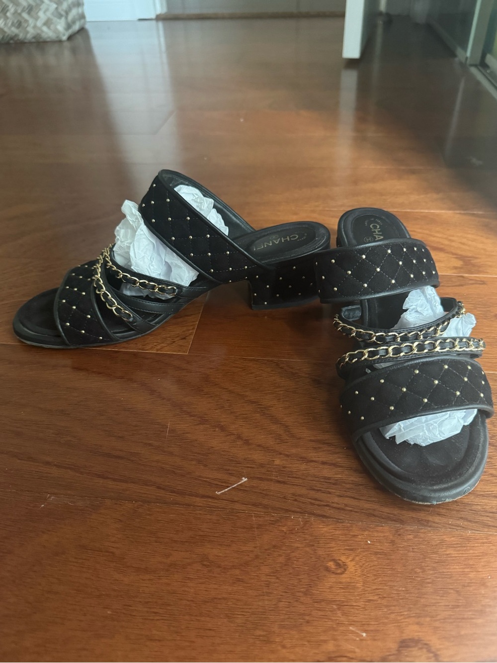CHANEL Black Quilted Slide Mules with Gold Chain Trim